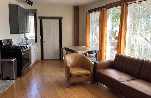 Pinedale Apartment | Large windows bring the outside in.