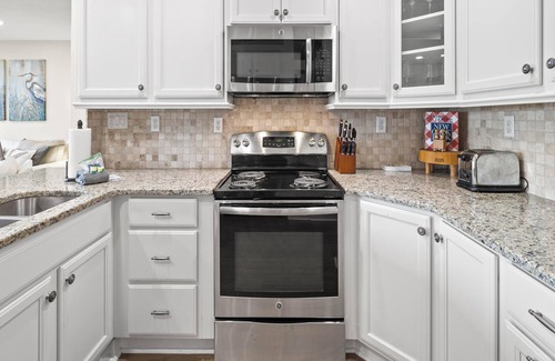 Fort Bay Condo | Latitude 29 Condominiums #18 | Gulf Front + Amenities