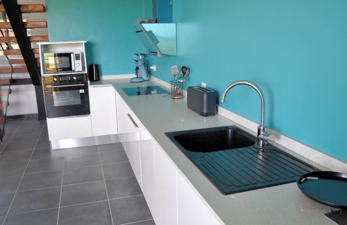 Le Moule Apartment | Lavender apartment, 3 air-conditioned bedrooms, and landscaped swimming pool