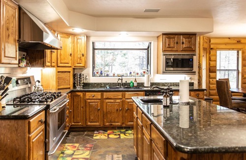 Torreon House | Lazy Bear Lodge in Torreon. Game room, hot tub, something for everyone!
