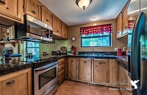 Ruidoso Cabin | Lazy Bear Lodge: 'Relaxation achieved' with hot tub.