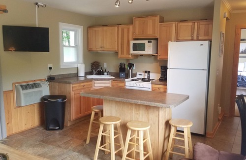 Lake Tomahawk Condo | Lazy Bear Lodge with Boat Slip on Lake Tomahawk