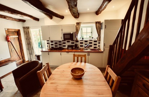 Riols Cottage | Le Chêne - stylish, family friendly gite with heated pool, playground and terraces