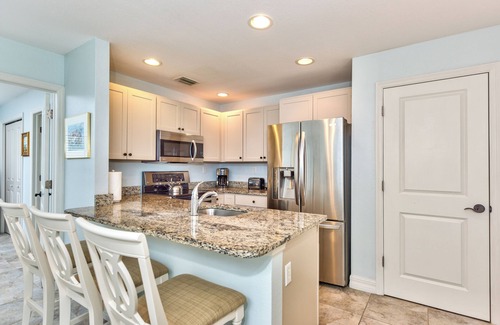 Old Naples Condo | Le Monaco - Romantic 1 BR Condo Steps from 5th Ave S. Chic Coastal Retreat with King Bed and Beach Access. Perfect Location for Couples Near Dining, Shopping, and Naples Beach