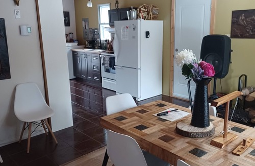 Papineau Regional County Municipality House | Le petit cottage du grand boisé - with wood-fired outdoor spa.