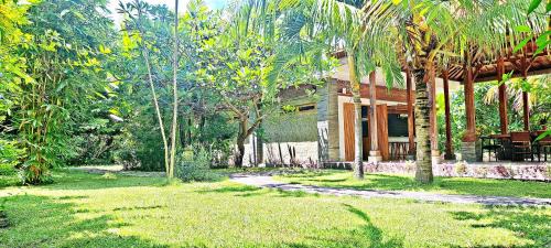 Kalisada Bed & Breakfast | Le Petit Leon's Traditional wooden house