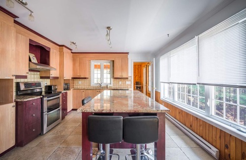 St-Adolphe-d'Howard Cottage | Le Rocher St-Joseph – Lakefront Chalet with Spa, Pool & Game Room