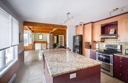 St-Adolphe-d'Howard Cottage | Le Rocher St-Joseph – Lakefront Chalet with Spa, Pool & Game Room