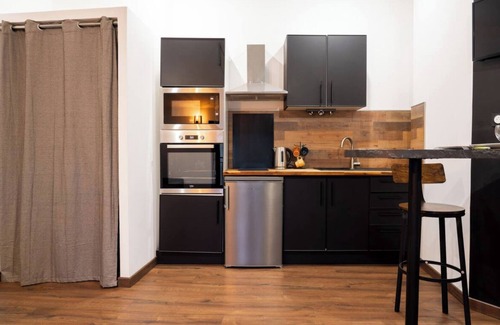 Saint-Laurent-sur-Saone Apartment | Le Sigorgne Downtown Station