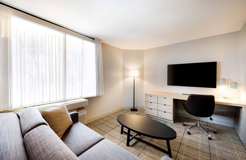 Exchange Place North Hotel | Learn at Ellis Island Museum! Sophisticated Suite! Parking Available!
