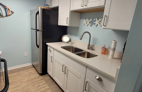 Surfside Beach Condo | Leave your worries behind in this cozy getaway right on the beach!