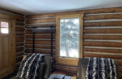 Highland Meadows Cabin | Lena's Cabin in Vail is nestled right beside Gore Creek, minutes from skiing.