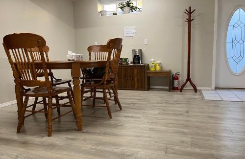 Promontory House | Licensed spacious basement suite with one king-size bed