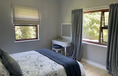 Wilderness House | Light airy home seconds from the beach.