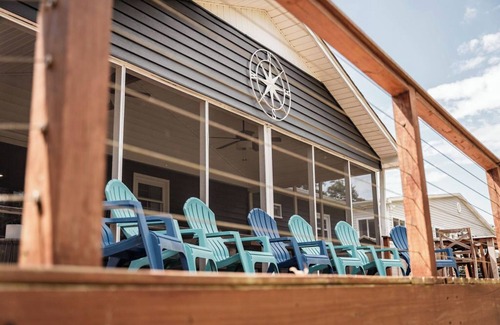 Fair Play House | Light & Airy Lakefront Home with Flat Yard, Private Dock, Deck & Screened Porch