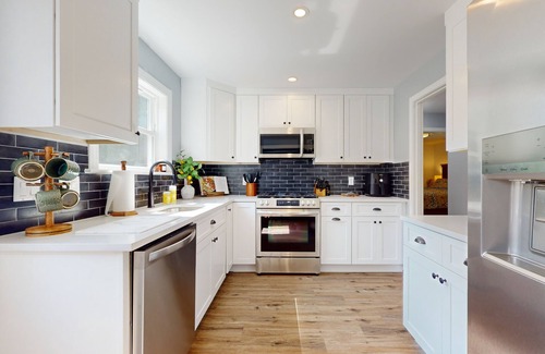 Foxboro House | Light-filled home near stadium and shops with AC, W/D, patio, & games