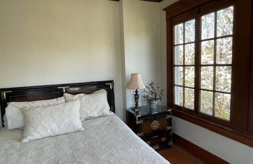 Carnation Bed & Breakfast | Light-filled room with a treetop view in an updated historic Forest Grove home!