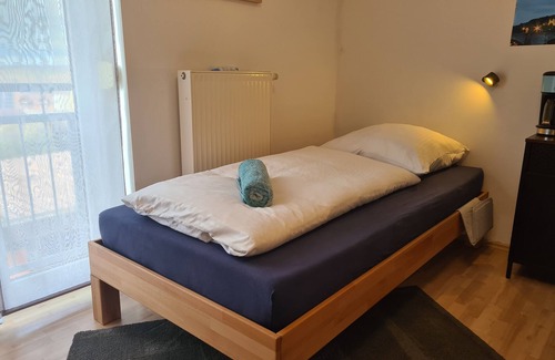 Waldbuttelbrunn Bed & Breakfast | Light-flooded room - Marienberg