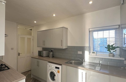 Knott End-on-Sea Apartment | Light House View Summ