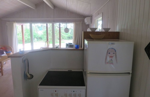 Follenslev Cottage | Light wooden cabin at Zealand's best beach.