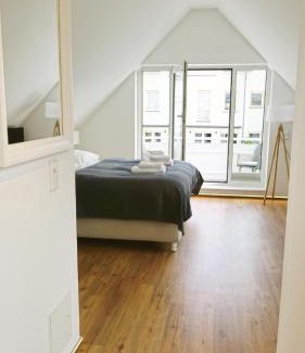 Warnemuende Apartment | LIGHTHOUSE HOMES - moderne Ferienwohnungen mit Terrasse am Kirchenplatz