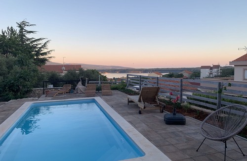 Kornic House | Lily mediterranean apartments with a sea view & heated shared pool