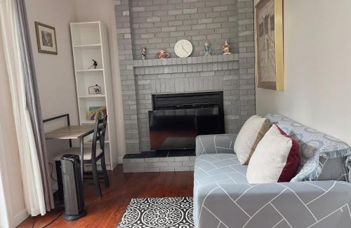 Southwest Calgary House | Lily room near golf and banff costco newly renovated queen size bed Single bathroom sofa TV