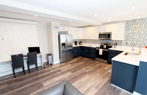 Rehoboth Beach Condo | LINENS & DAILY ACTIVITIES INCLUDED! OCEANFRONT/BOARDWALK BUILDING W/ROOFTOP POOL Enjoy this home away from home! Everything is new in this top floor luxury condo including all furniture, mattresses and bedding.