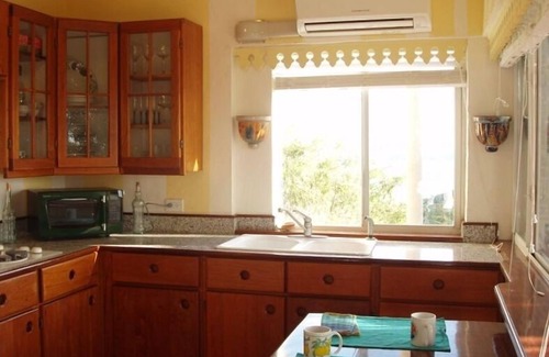Red Hook Apartment | Lion's Gate Getaway- Lush Setting. Check for seasonal discounts