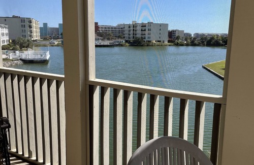 Cherry Grove Beach Condo | Listen to ocean waves from this beautifully updated condo with a lake view!
