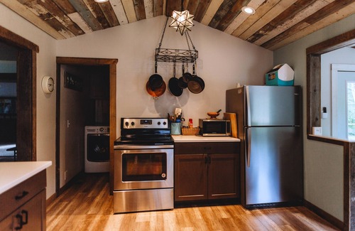 Riverside Cottage | Little Blue Cottage - wooded getaway, near beaches and towns