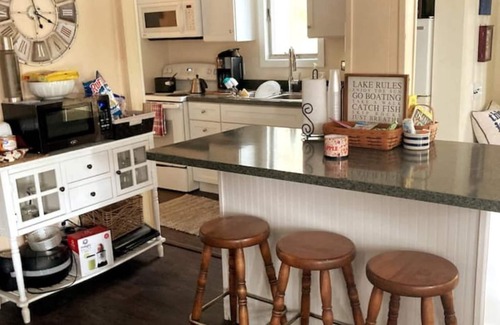 Harrison Cottage | Little Lake House on the Hill in Harrison, MI
