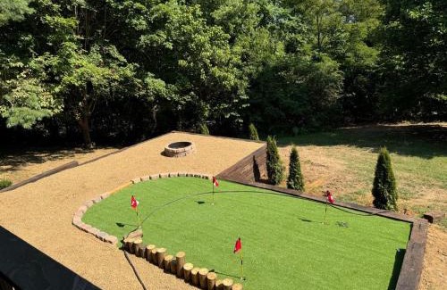 Sevierville House | Little Mountain Cabin - 3-Bedroom Retreat with Hot Tub, Fire Pit, Games, and Serene Nature Views