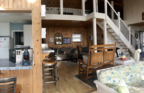 Chippewa Lake House | Little White Cottage on Chippewa Lake just steps to the waters edge.