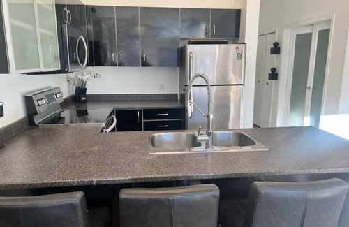 Langford Condo | Live like a tourist in Langford Downtown