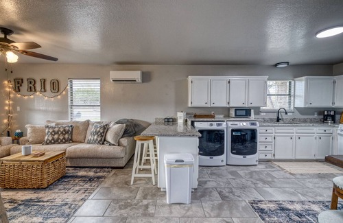 Concan House | Live Oak Cottage on a beautiful lot with large oak trees and fenced backyard.