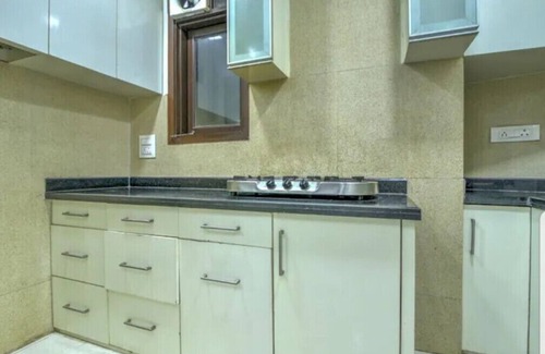 Kalkaji Apartment | Lively 2 BHK Apartment- Park Facing, close to market by HostMyStay