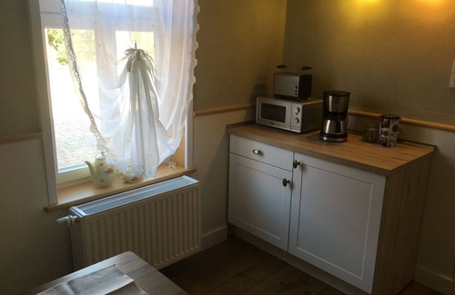 Dassel Apartment | Living in the mill building, surrounded by green meadows.