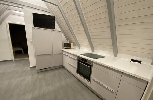 Barmstedt Apartment | Living under the roof