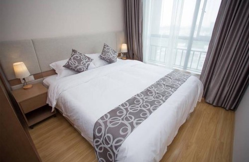 Zhengdong New Area Apartment | Liwu Apartment-Green Land Plaza Branch