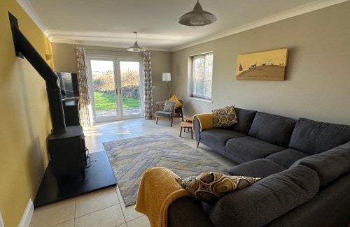 Llansteffan House | Llais Y Mor- Spacious 4 bedroom home with coastal views and nearby beach