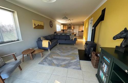 Llansteffan House | Llais Y Mor- Spacious 4 bedroom home with coastal views and nearby beach