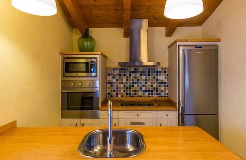 Beceite Apartment | Lo Tossal I. Penthouse with fireplace and terrace