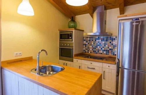 Beceite Apartment | Lo Tossal I. Penthouse with fireplace and terrace
