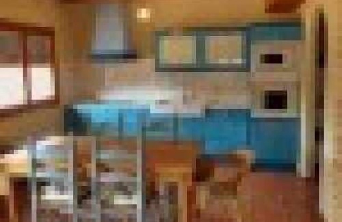 Beceite Apartment | Lo Tossal II. fireplace and terrace