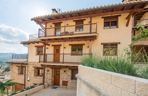 Beceite Apartment | Lo Tossal II. fireplace and terrace