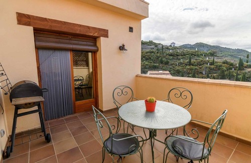Beceite Apartment | Lo Tossal III. 2 bedrooms, fireplace and terrace.