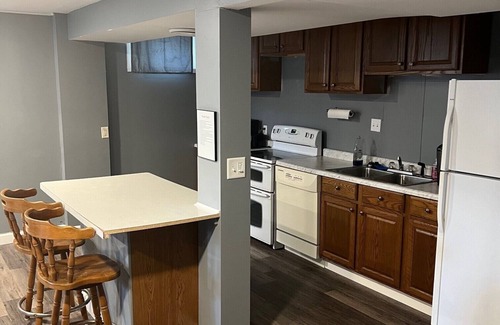 Okoboji House | Located across the road of West Lake Okoboji. 8 beds. Room for parking trailers