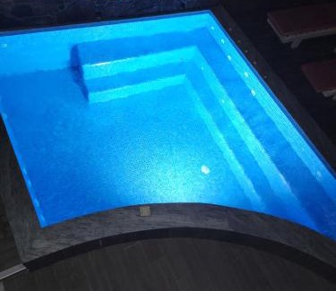 Perissa Villa | Located by the sea one beachfront Private Captain Lazaros Pool Villa with loft in 750sqm spacious private plot-Jacuzzi-sunrelax-furnished terace-gazebo-private parking,sleep 3 adults and 2 children, just steps from the Black Beach-Seaview