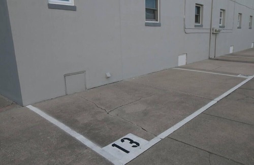 Stone Harbor Condo | located in the heart of Stone Harbor just 3 blocks from downtown 96th Street shopping area and 1 1/2 blocks to the beach. The courtyard is furnished with outdoor table, chairs and umbrellas.